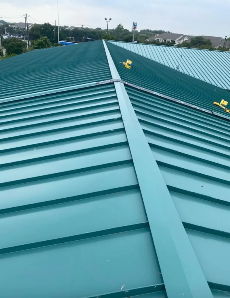 Green commercial metal roof ridge and valley for Metal Roof Repair in Heartland