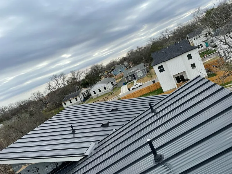 Standing seam metal roof panels with vents for Skylight Repair in Heartland